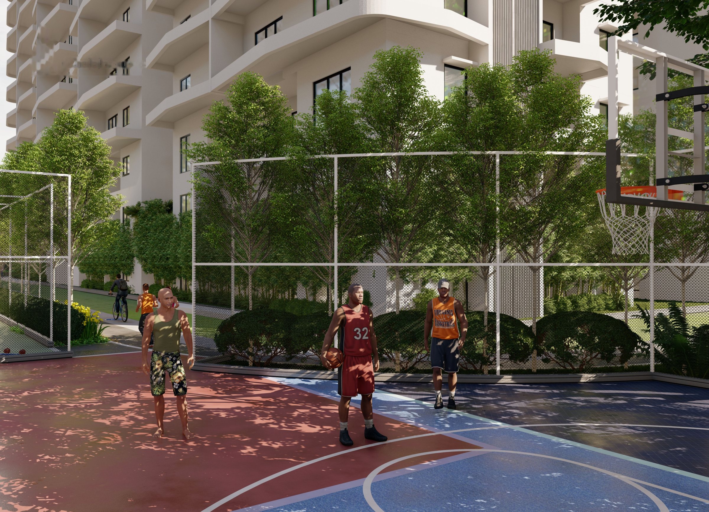 Outdoor basketball court surrounded by greenery and residential towers at Lumbini Elysee